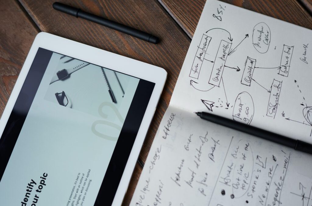 Photo Of Pen On Top Of Notebook