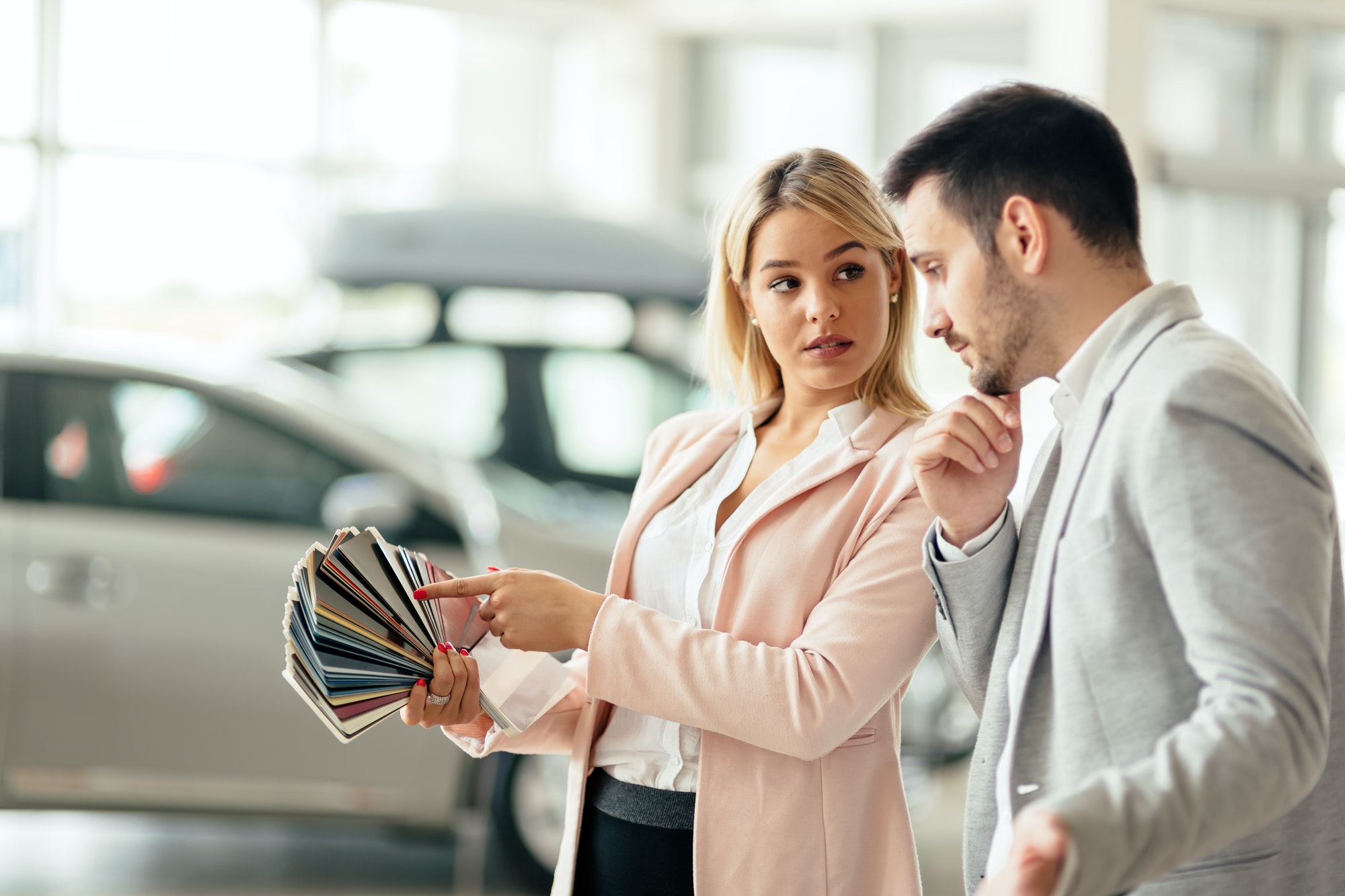 Customer choosing car color Customer choosing car color